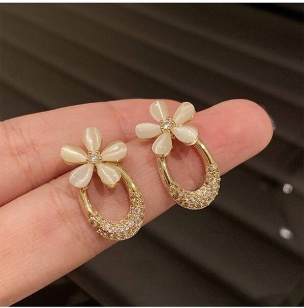 Sparkling Elegance Gleaming Gold-Plated American Diamon...